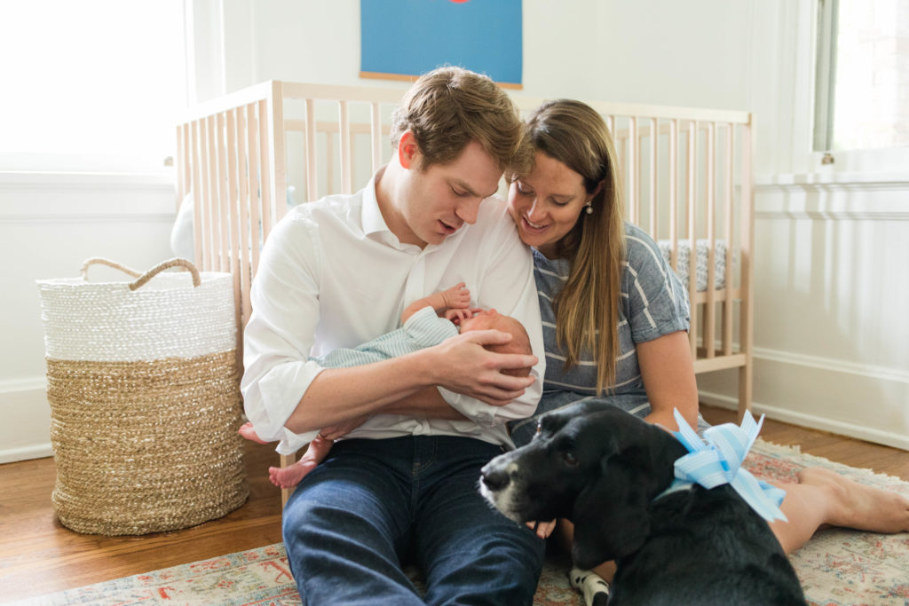 Mom Dad Newborn baby and dog in-home lifestyle photo by Cincinnati Hyde Park Photographer