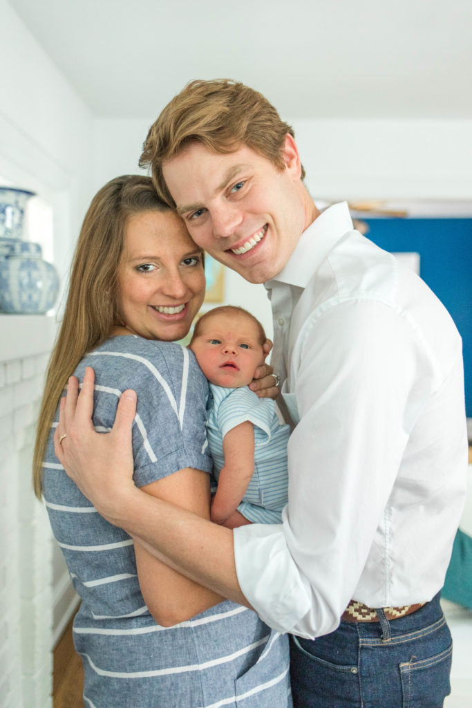 Mom Dad and Newborn baby in-home lifestyle photo by Cincinnati Hyde Park Photographer